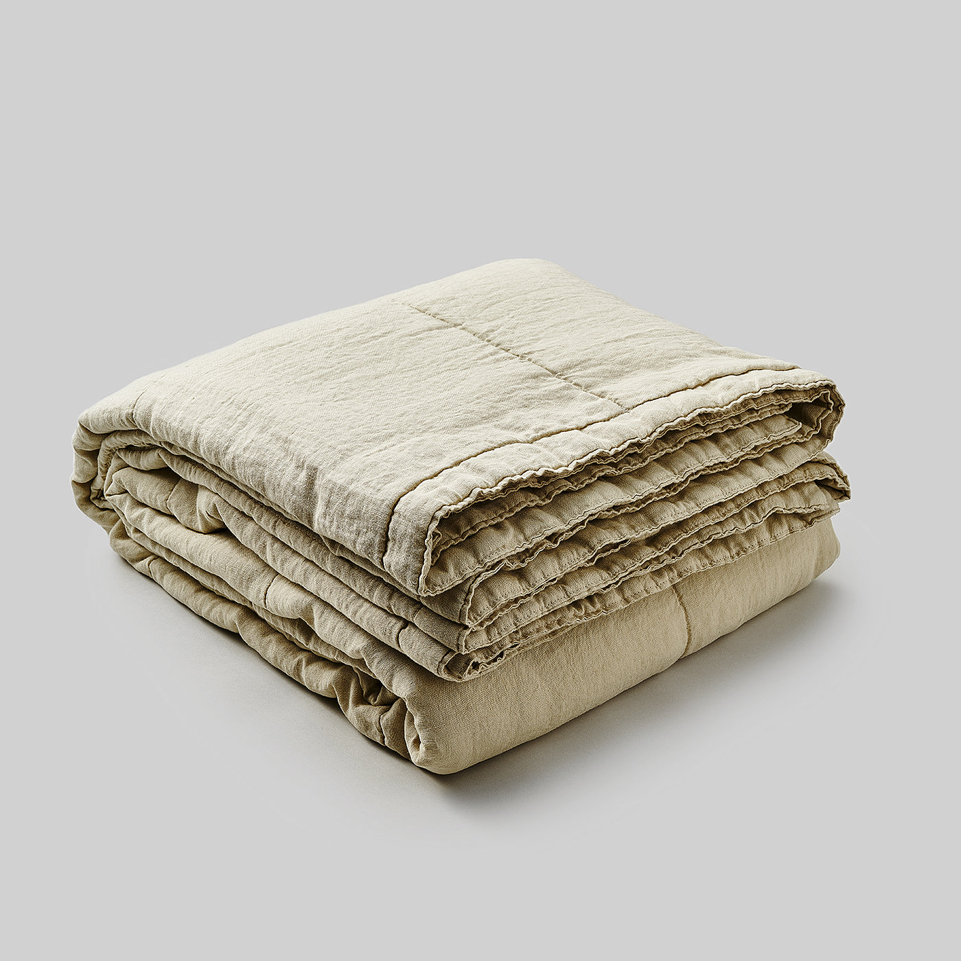 Gesteppte Sofadecke aus Leinen in Sand Beige