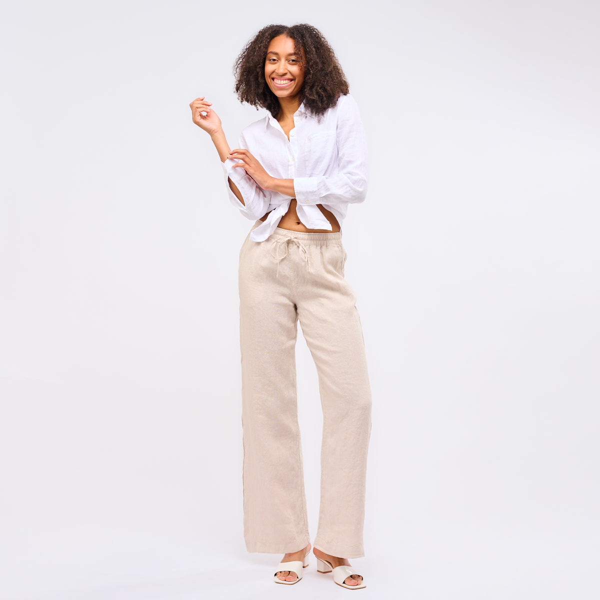 Leinenhose Damen Sand Beige, elegante lange Leinenhose in Sandbeige mit luftigem Schnitt, ideal für warme Tage.